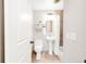 Small bathroom featuring tile flooring, a shower/tub, and a white pedestal sink at 2756 E Euclid Ave, Centennial, CO 80121