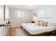 Bright bedroom with hardwood floors, two windows, and neutral decor at 2756 E Euclid Ave, Centennial, CO 80121