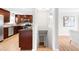 Bright and open kitchen featuring stainless steel appliances, wood cabinets, and sleek countertops at 2756 E Euclid Ave, Centennial, CO 80121