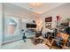 Well-lit home office with large windows, modern desk setup, and comfortable seating at 35 Elati St, Denver, CO 80223
