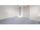 Bedroom with closet, carpeted floor, and exposed subfloor at 5493 Quari St, Denver, CO 80239