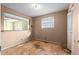 Small bedroom with exposed subfloor and closet at 5493 Quari St, Denver, CO 80239