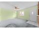 Spacious living room with light green walls and carpet at 5493 Quari St, Denver, CO 80239