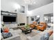 Inviting living room boasting high ceilings, modern lighting, and an elegant fireplace at 9455 Flattop St, Arvada, CO 80007