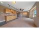 Basement featuring large open area and wet bar at 31231 Red Hawk Trl, Conifer, CO 80433