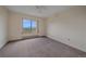 Bedroom with neutral carpet, mountain view, and natural light at 31231 Red Hawk Trl, Conifer, CO 80433