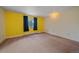 Bright bedroom features a large window, plush carpeting and ample closet space at 31231 Red Hawk Trl, Conifer, CO 80433