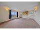 A bright bedroom with large windows offering scenic mountain views and natural light at 31231 Red Hawk Trl, Conifer, CO 80433