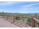 Expansive deck with forest views, perfect for outdoor relaxation and entertainment at 31231 Red Hawk Trl, Conifer, CO 80433