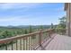 Outdoor deck area providing panoramic mountain views and serene natural surroundings at 31231 Red Hawk Trl, Conifer, CO 80433