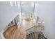 Bright foyer features a staircase and hardwood floors at 5789 S Jay St, Littleton, CO 80123