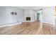 Inviting living room with a tile fireplace and hardwood flooring at 5789 S Jay St, Littleton, CO 80123