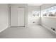 Bright bedroom with a closet and three windows at 1401 S Clarkson St, Denver, CO 80210