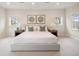 Bright bedroom featuring neutral tones, recessed lighting, and modern furnishings at 1401 S Clarkson St, Denver, CO 80210