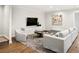 Cozy living room with plush seating and modern decor at 1401 S Clarkson St, Denver, CO 80210