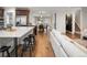 Open-concept layout with a view from the kitchen into the dining and living areas at 1401 S Clarkson St, Denver, CO 80210