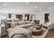 Open concept living room flows into the kitchen and dining area at 1401 S Clarkson St, Denver, CO 80210