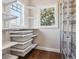 Walk in pantry with custom shelving and lots of natural light at 1401 S Clarkson St, Denver, CO 80210