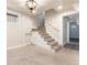 Finished basement boasts fresh paint, updated carpet on the stairs, and an open layout at 1308 York St, Denver, CO 80206