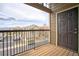 Apartment balcony overlooking parking lot and mountain range at 2875 Blue Sky Cir # 4-303, Erie, CO 80516