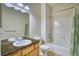 Full bathroom featuring large vanity, shower and tub combo, and a toilet at 2875 Blue Sky Cir # 4-303, Erie, CO 80516