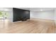 Unfinished basement with walkout access to the backyard at 2180 Myrtlewood Ln, Lakewood, CO 80215