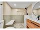 Beautiful bathroom with large shower and bench, modern vanity, and stylish tile flooring at 3798 S Wabash St, Denver, CO 80237