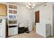 Storage room with a shelving system, a mini fridge, boxes and carpet floors, perfect for organization at 14444 E Colorado Dr # 204, Aurora, CO 80012