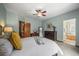 Spacious bedroom with ensuite bathroom access and nice carpet at 6475 Umber Cir, Arvada, CO 80007