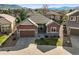 Inviting single-Gathering home with a well-maintained yard and a two-car garage in a desirable neighborhood at 6475 Umber Cir, Arvada, CO 80007