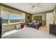 Bedroom with a large window provides plenty of natural light at 2462 W Peakview Ct, Littleton, CO 80120