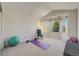 Versatile room with bay windows providing natural light and ample space for various activities at 2462 W Peakview Ct, Littleton, CO 80120