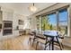 Eating nook with attached built-in oven and an oversized window with nature views at 2462 W Peakview Ct, Littleton, CO 80120