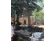 Backyard with elevated seating, a built in grill, a bicycle course and a wood fence at 426 Jupiter Dr, Lone Tree, CO 80124