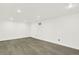 Unfurnished basement area with neutral color walls and modern flooring at 426 Jupiter Dr, Lone Tree, CO 80124