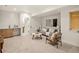 Inviting finished basement space with wet bar, and comfortable seating area at 1344 N Knox Ct, Denver, CO 80204