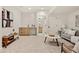 Finished basement featuring a seating area, wet bar and bathroom with designer touches at 1344 N Knox Ct, Denver, CO 80204