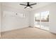 Minimalist bedroom with neutral carpet, recessed lighting, a modern window, and sliding glass doors at 1344 N Knox Ct, Denver, CO 80204