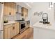 Well-equipped kitchen featuring stainless steel appliances, modern cabinets, and quartz countertops at 1344 N Knox Ct, Denver, CO 80204