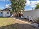 Spacious backyard with patio seating and detached garage at 2537 Chase St, Edgewater, CO 80214