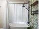Spa-like bathroom with a soaking tub and walk-in shower at 2537 Chase St, Edgewater, CO 80214