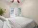 Cozy bedroom with ample natural light and window blinds at 2537 Chase St, Edgewater, CO 80214