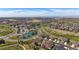 Residential community featuring tennis courts, clubhouse, and manicured landscaping at 7895 S Zante Ct, Aurora, CO 80016