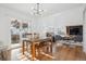 Open concept dining area with hardwood floors and access to backyard at 22382 E Mercer Pl, Aurora, CO 80018