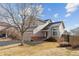 Two-story house with attached garage and well-maintained yard at 22382 E Mercer Pl, Aurora, CO 80018