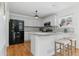 Modern kitchen with white cabinets and granite countertops at 22382 E Mercer Pl, Aurora, CO 80018