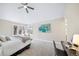 Bright bedroom featuring large windows, plush carpet, and an art piece at 20838 Parliament Ct, Parker, CO 80138