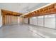 Spacious garage with painted floors, ample storage space, and multiple car capacity at 20838 Parliament Ct, Parker, CO 80138