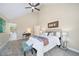 Bright main bedroom with a vaulted ceiling, ceiling fan, ensuite bath and walk-in closet at 20838 Parliament Ct, Parker, CO 80138