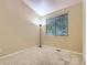 Small bedroom featuring plush carpeting and a sunlit window at 19346 E Clear Creek Way, Parker, CO 80134